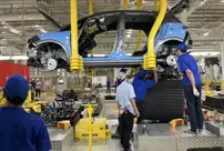 The world-famous automotive company will lay off thousands of employees.