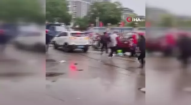 A vehicle in China crashed into a crowd outside a school! Many students were injured.