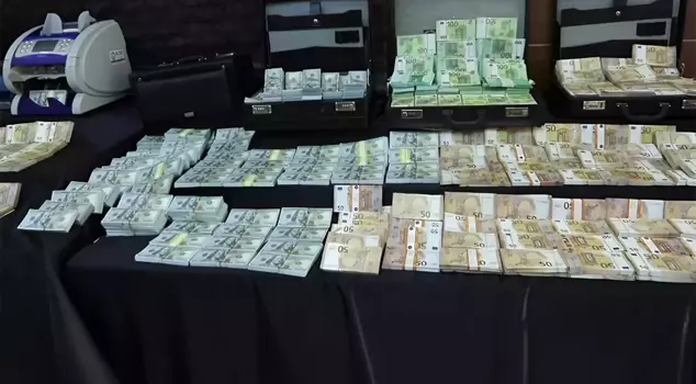 Millions of counterfeit dollars and euros were seized in Istanbul.