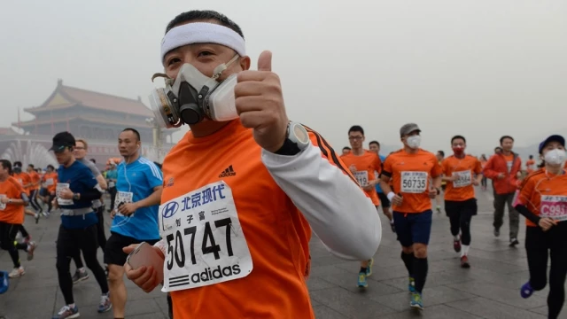 Runners Choke To Finish Contaminated Beijing Marathon