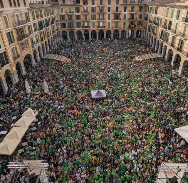 They don't want tourists in the country! 10,000 people took to the streets with giant banners