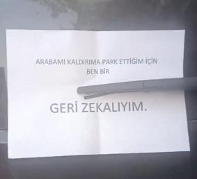 A lesson-like note was hung on the car parked on the sidewalk in Istanbul