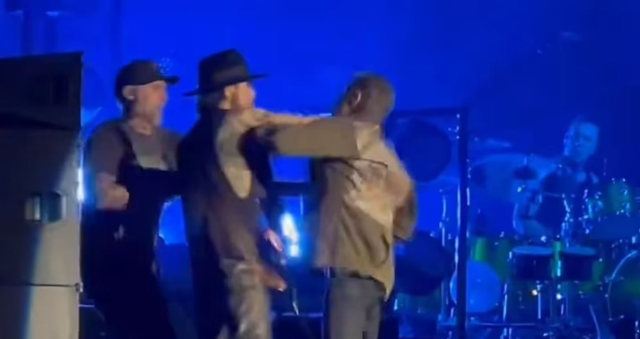 Rock band lead singer punches guitarist on stage, concert ends