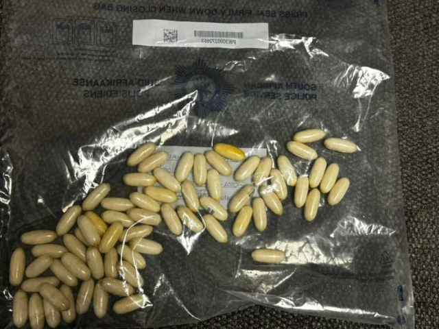 A woman with numerous drug capsules in her stomach was arrested in South Africa