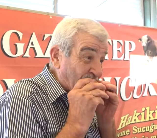 Food terrorism at the market! Unlabeled sausages, products displayed openly with flies