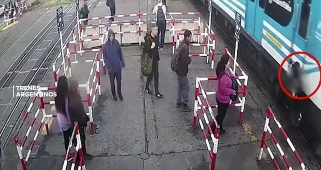 A train hit a woman crossing the tracks while looking at her phone in Argentina