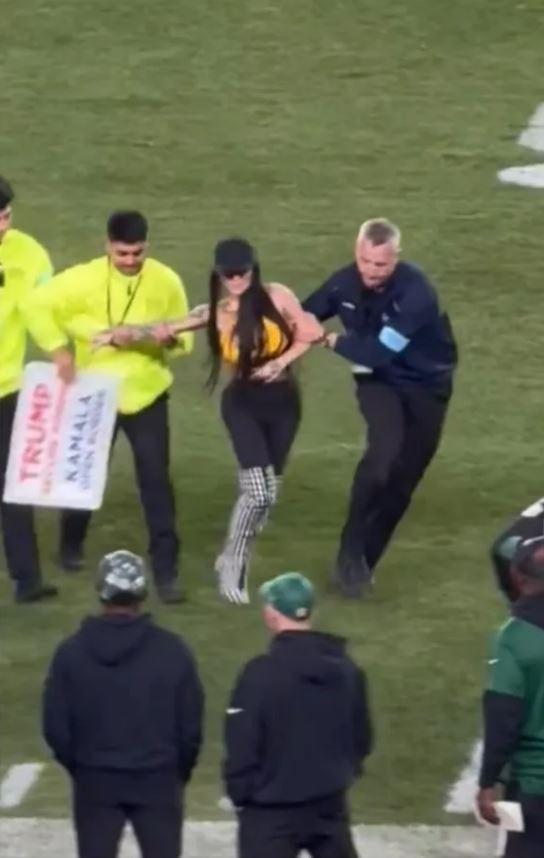 Trump supporter Instagram model entered the field during a football game in the USA