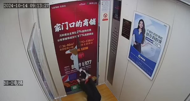 A dog whose leash got stuck in the elevator door in China narrowly escaped drowning