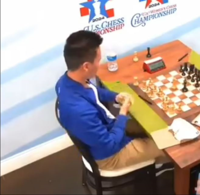 The chess master who punched a female reporter after his defeat was arrested