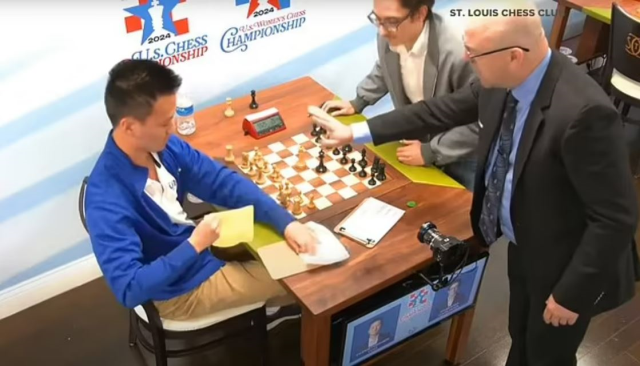 The chess master who punched a female reporter after his defeat was arrested