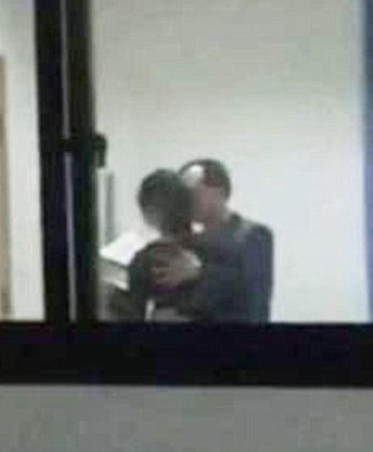 The teacher caught on camera forcibly kissing a girl student in class has been fired