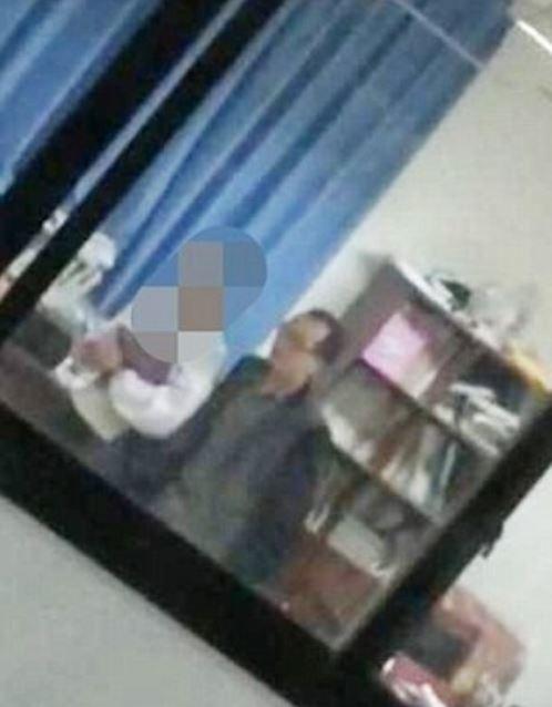 The teacher caught on camera forcibly kissing a girl student in class has been fired