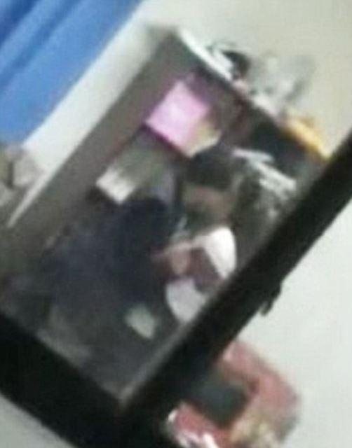 The teacher caught on camera forcibly kissing a girl student in class has been fired