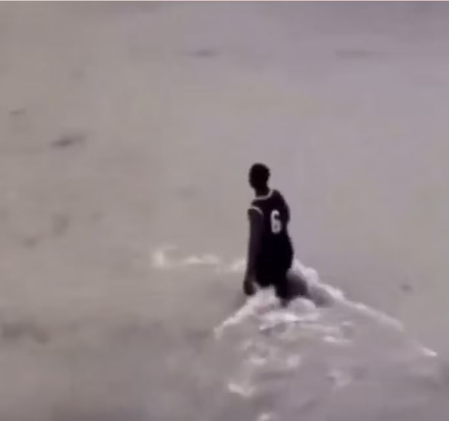 The hero man rescued the elderly woman caught in the floodwaters