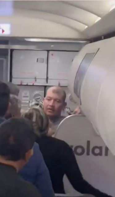 The passenger attempting to hijack the plane by entering the cockpit was subdued by other passengers