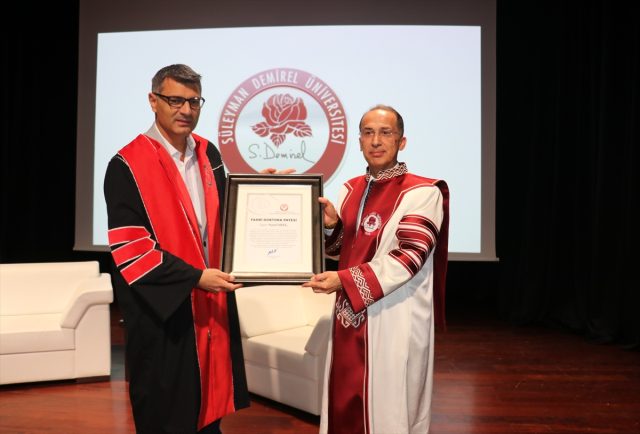 An honorary doctorate was awarded to Yusuf Dikeç by Süleyman Demirel University