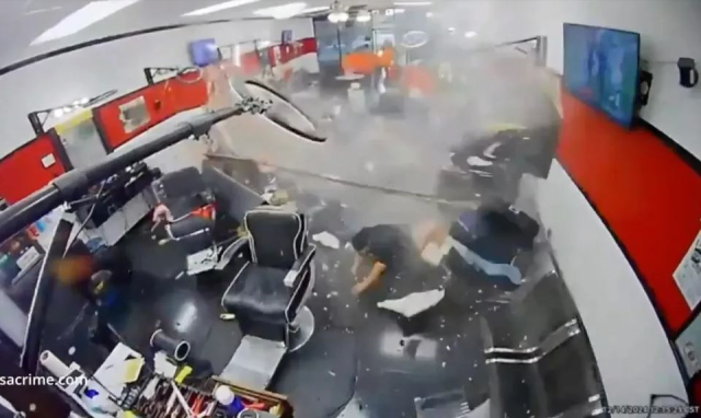 Luxury car out of control crashed into the barbershop