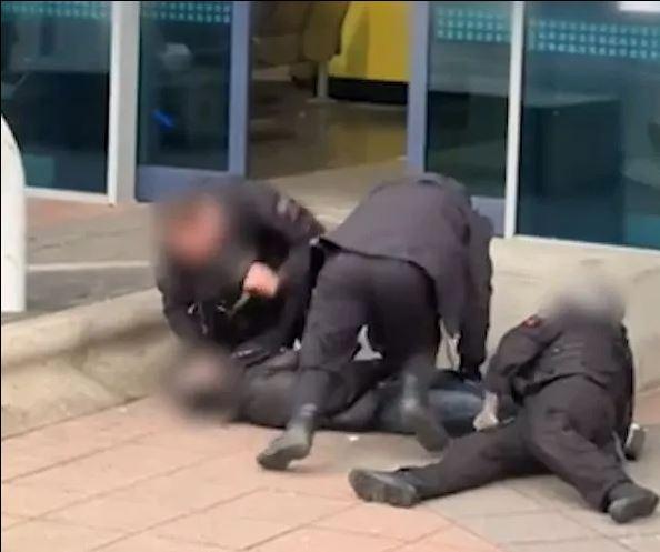 Police violence at Manchester Airport captured on camera