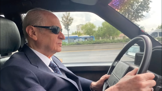 Bahçeli drove through the streets of Ankara with Ferdi Tayfur's song