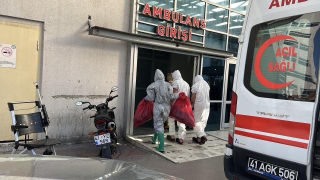 Four workers who cleaned the chemical tank were hospitalized