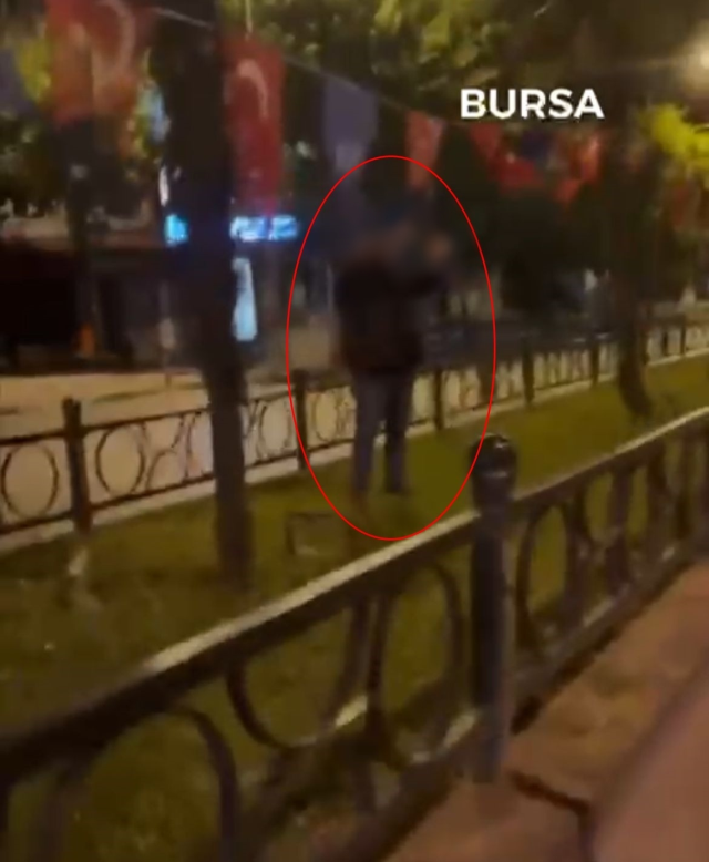 The person attempting to burn the Turkish flag fled without looking back when confronted