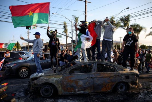 Los Angeles in flames: Protesters clashing with National Guards set vehicles on fire