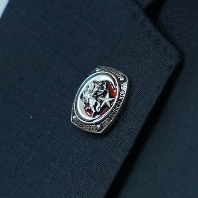 Bahçeli's ring and badge caught attention! Here is the message on it
