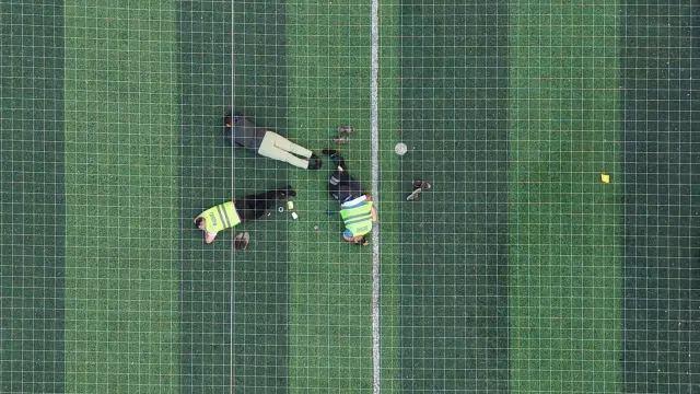 Firefighters who fought the flames for 12 hours rested like this on the field