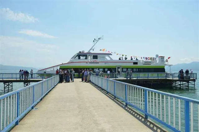 The pier where a sea bus used to dock in Lake Iznik is now stranded on land