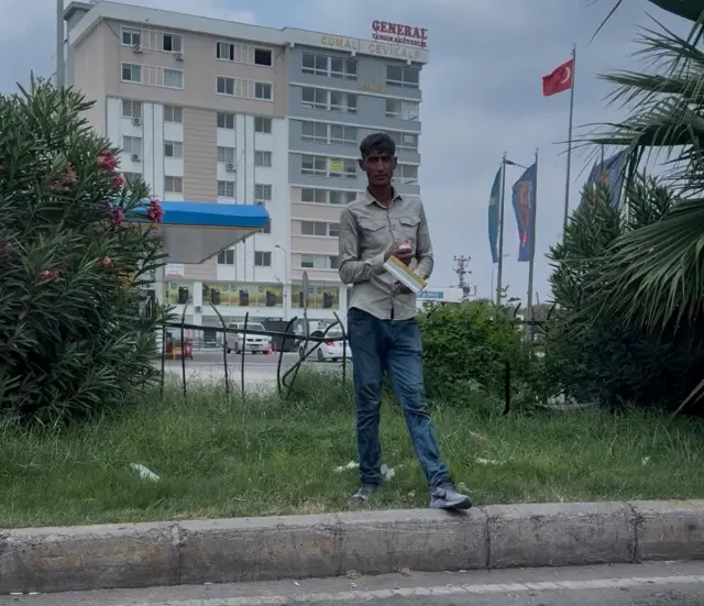 They are forcing to clean windows and asking for money by opening doors