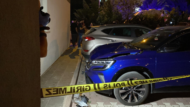 The woman who fell from the 14th floor onto the car has died