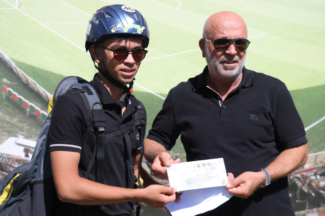 He landed at the club facility with the world third trophy and gave the trophy to the president
