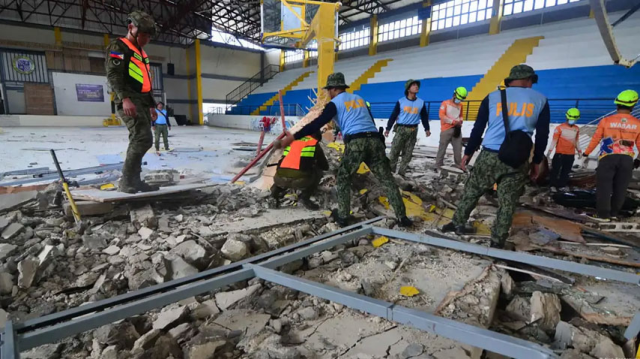 The death toll from the 6.9 magnitude earthquake that struck the Philippines has risen to 61