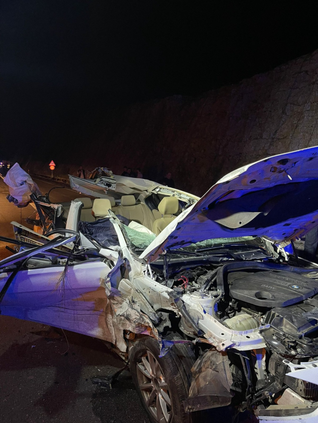 The wrecked car separated the elderly couple from death