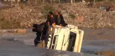 Azgın Sularda Can Pazarı... Mahsur Kalan 2 Kişi Böyle Kurtarıldı