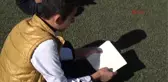 Batman'da 2 Bin Kişi Futbol Sahasında Ellerinde Kitapla 'Oku' Figürü Oluşturdu