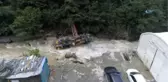 Selde Dereye Yuvarlanan İş Makinesinin Şoförü: 