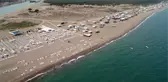 Antalya'da çardaklarda denize sıfır ücretsiz tatil yapıyorlar
