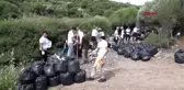 ÇANAKKALE Assos, kaçak göçmenlerden kalan çöplerden temizleniyor