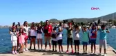 Foça'da öğrenciler sporla çevre temizliği yaptı