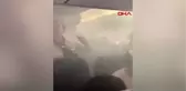 DHA DIŞ ' Yolcu uçağında korku dolu anlar' Kabini dumanla dolan uçak acil iniş yaptı