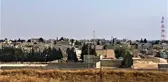 Resulayn sokaklarından çocuk, minarelerden ezan sesi yükseliyor
