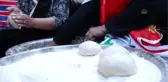 Irak'ta gösterilerin merkezi Tahrir Meydanı'nın gönüllü kadınları