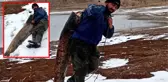 Görenler hayretler içinde kaldı! Boyundan büyük balığı taşımakta zorlandı