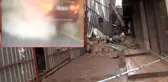 Otomobil sürücüsü, çöken binanın altında kalmaktan son anda kurtuldu