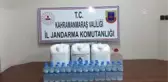 Kırsalda bir evde 44,5 litre kaçak içki ele geçirildi