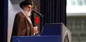 Hamaney, cuma hutbesinde yanında tüfekle vaaz verdi