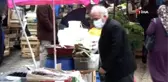 Erzurumlular yağmura aldırış etmedi, şemsiyesini alan pazara koştu