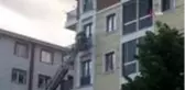 Balkona sıkışan güvercini itfaiye kurtardı