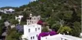Firari Can Dündar'ın Bodrum'daki villasının kaçak bölümünde yıkım başladı